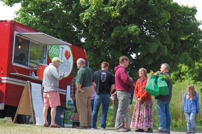 A line forms out of the food truck